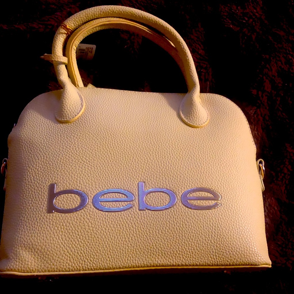 BEBE Fabiola stamped dome yellow/gold logo NWT